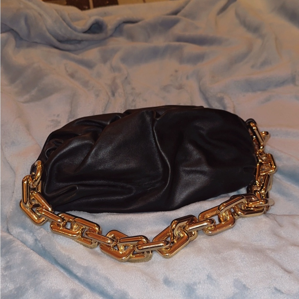 Bottega Veneta Elegant Black Leather Clutch with Gold Chain